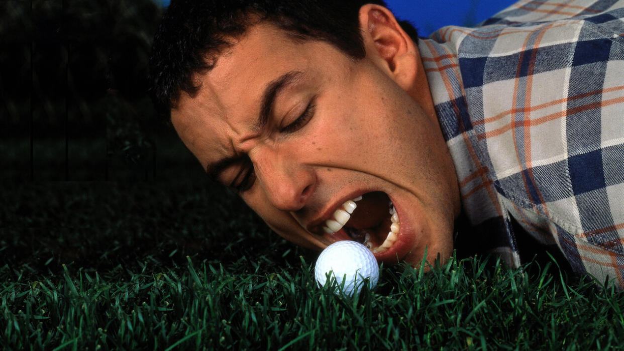  Adam Sandler shouting at a golf ball in Happy Gilmore. 