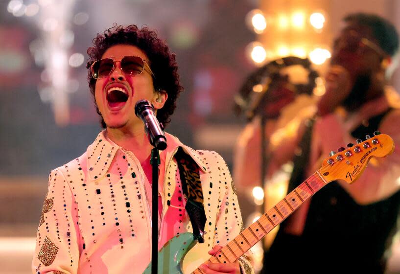 LAS VEGAS, NEVADA - APRIL 03: Bruno Mars of Silk Sonic performs onstage during the 64th Annual GRAMMY Awards at MGM Grand Garden Arena on April 03, 2022 in Las Vegas, Nevada. (Photo by Rich Fury/Getty Images for The Recording Academy)