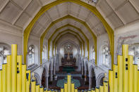 <p>Yellow pipe organ at a former British church. (Photo: James Kerwin/Caters News) </p>
