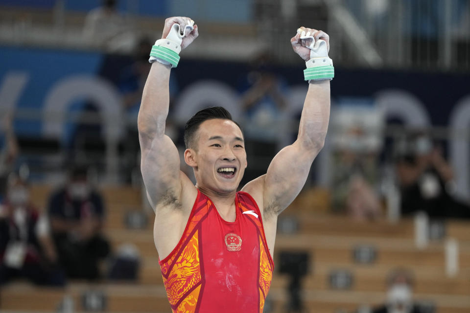 Xiao Ruoteng, of China, celebrates after finishing his performance on the horizontal bar during the artistic gymnastics men's all-around final at the 2020 Summer Olympics, Wednesday, July 28, 2021, in Tokyo. (AP Photo/Natacha Pisarenko)