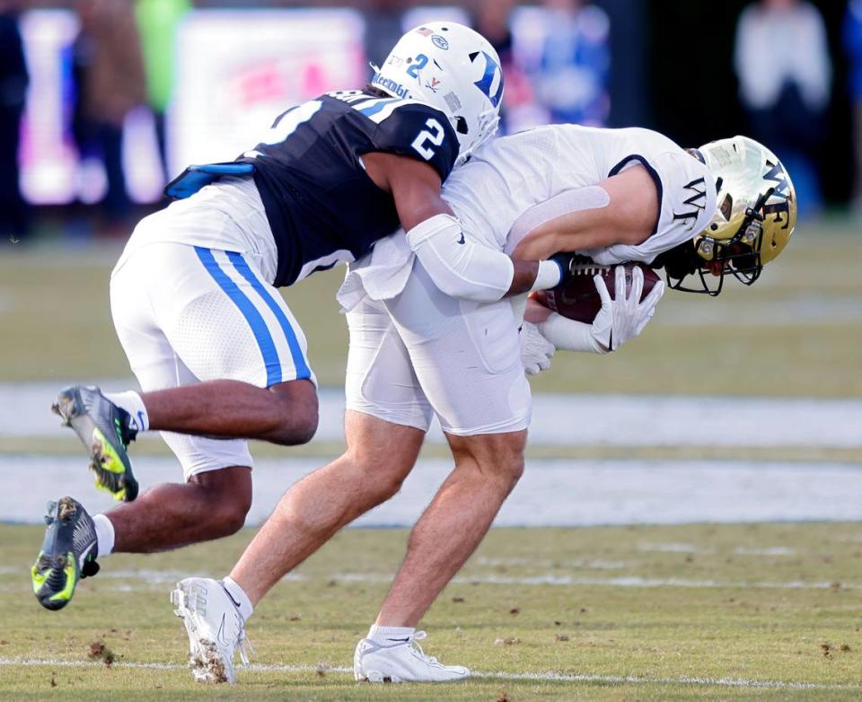 Duke’s Jaylen Stinson tackles Wake Forest’s Taylor Morin during the first half of the Blue Devils’ final regular season game at Wallace Wade Stadium on Saturday, Nov. 26, 2022, in Durham, N.C.