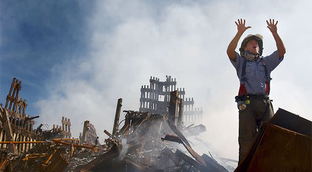 A New York City fireman calls for 10 more rescue workers to make their way into the rubble of the World Trade Center September 14, 2001 days after the September 11, 2001 terrorist attack. Photo: Getty Images