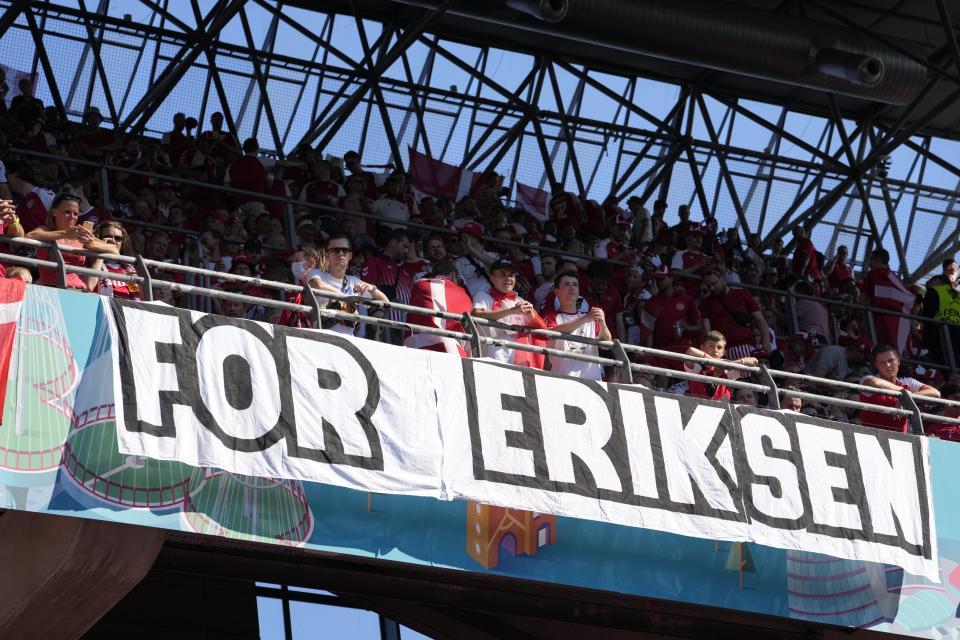 Danish fans wait for the start of the Euro 2020 soccer championship group B match between Denmark and Belgium at Parken stadium in Copenhagen, Denmark, Thursday, June 17, 2021. (AP Photo/Martin Meissner, Pool)