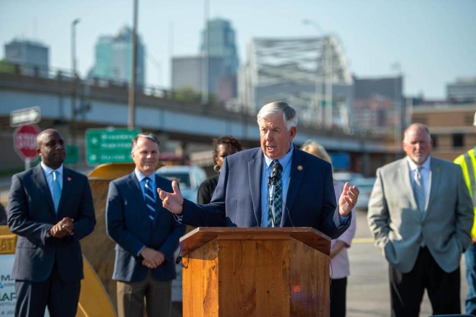 Missouri Gov. Mike Parson attends a ceremonial bill signing event near the Buck O’Neil Bridge in Kansas City on Tuesday morning, July 13, 2021. The bill increases the state’s gasoline tax for the first time in decades.