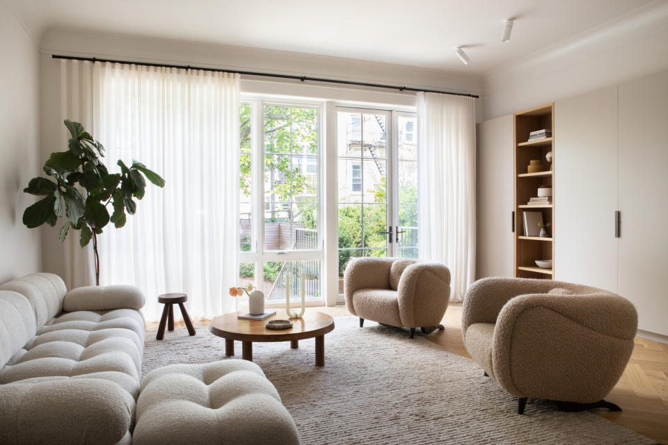 A fiddle leaf fig tree in a minimalist living room