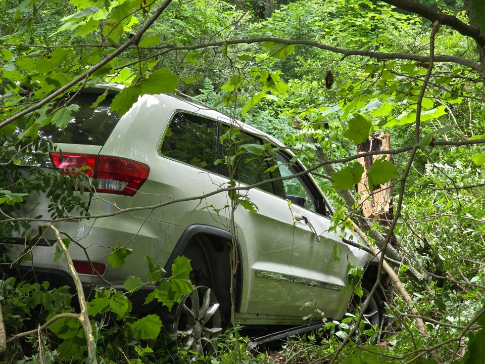 A couple of wanted fugitives led Alliance Police on a high-speed chase Friday, July, 5, 2024, that ended with in this crash in Portage County. The driver lost control of a Jeep Cherokee with a blown tire, and went down a ravine. Both men were arrested.