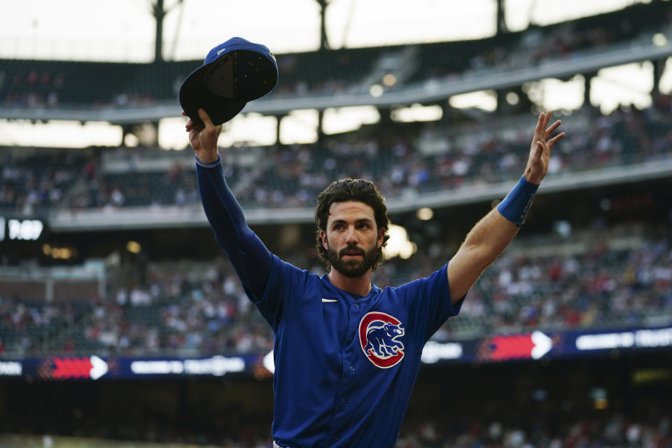 Chicago Cubs shortstop Dansby Swanson waves to the crowd before a baseball game against his former team the Atlanta Braves, Tuesday, Sept. 26, 2023, in Atlanta. (AP Photo/John Bazemore)