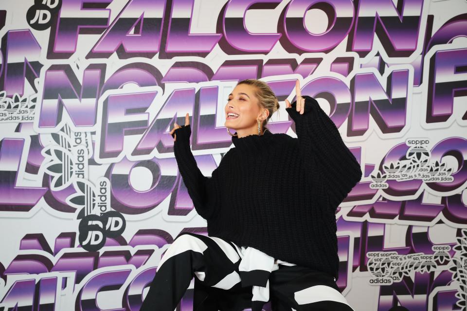 LONDON, ENGLAND - SEPTEMBER 17:  Hailey Baldwin poses ahead of the launch of the Icy Pink adidas Falcon at JD show on September 17, 2018 in London, England.  (Photo by Tristan Fewings/Getty Images for adidas)