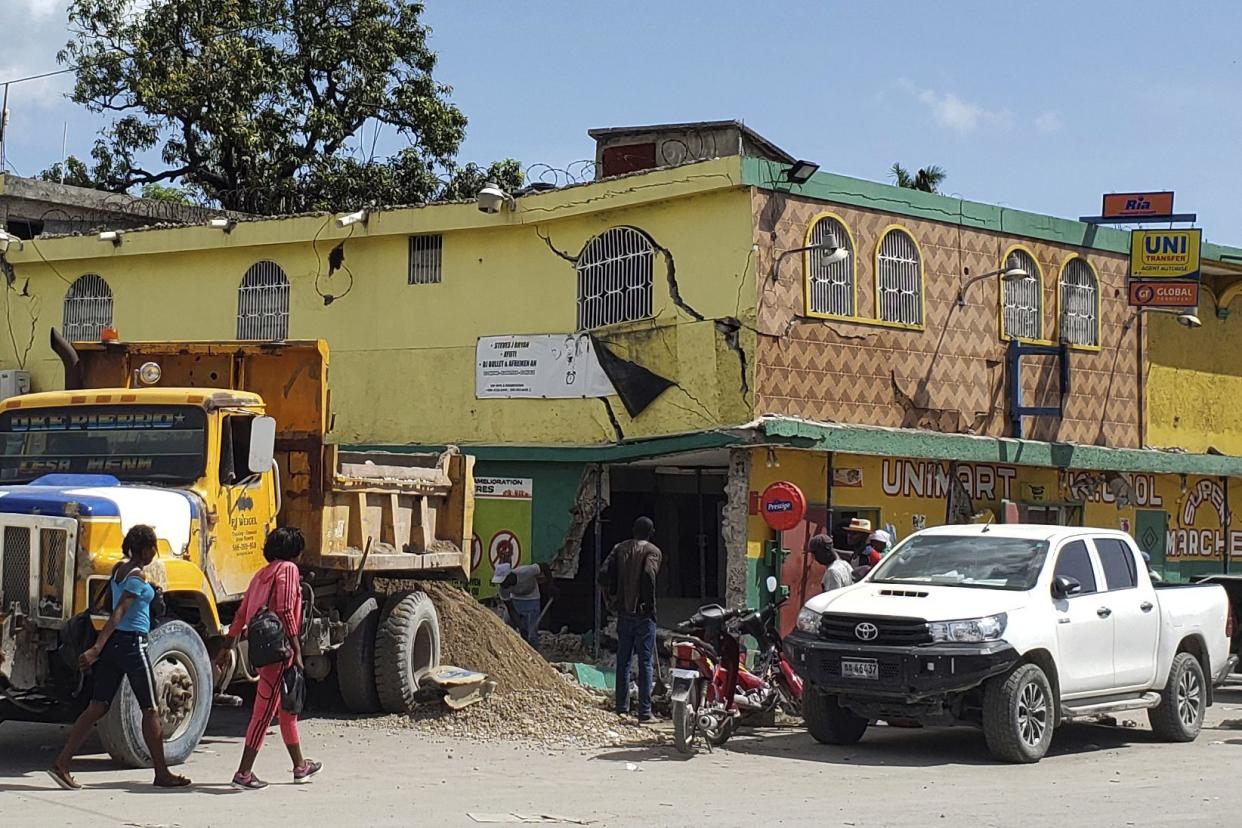 The K-oriol mini-mart building is damaged after an earthquake in Les Cayes, Haiti on Saturday, Aug. 14, 2021.