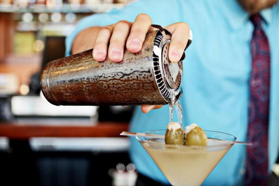 Co-owner Brad Weddington of NanaSteak in Durham makes a martini at the restaurant’s bar in 2016. Nana Steak is just a few steps from DPAC.