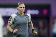 Referee Stephanie Frappart warms up prior to the World Cup group E soccer match between Costa Rica and Germany at the Al Bayt Stadium in Al Khor , Qatar, Thursday, Dec. 1, 2022. (AP Photo/Hassan Ammar)