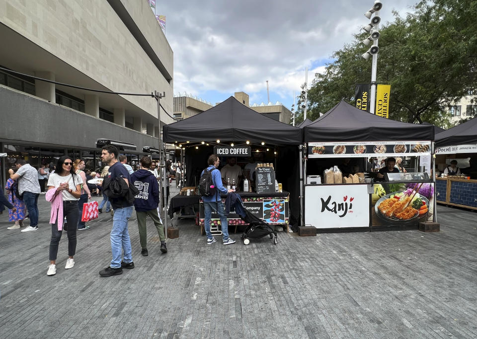 Tourists and residents alike visit The Ethiopian Coffee Company’s stall at Southbank Centre’s weekly Food Market in central London on Saturday, Sept. 2, 2023. The London-based International Coffee Organization has declared this Sunday, Oct. 1, as International Coffee Day.(AP Photo/Almaz Abedje)