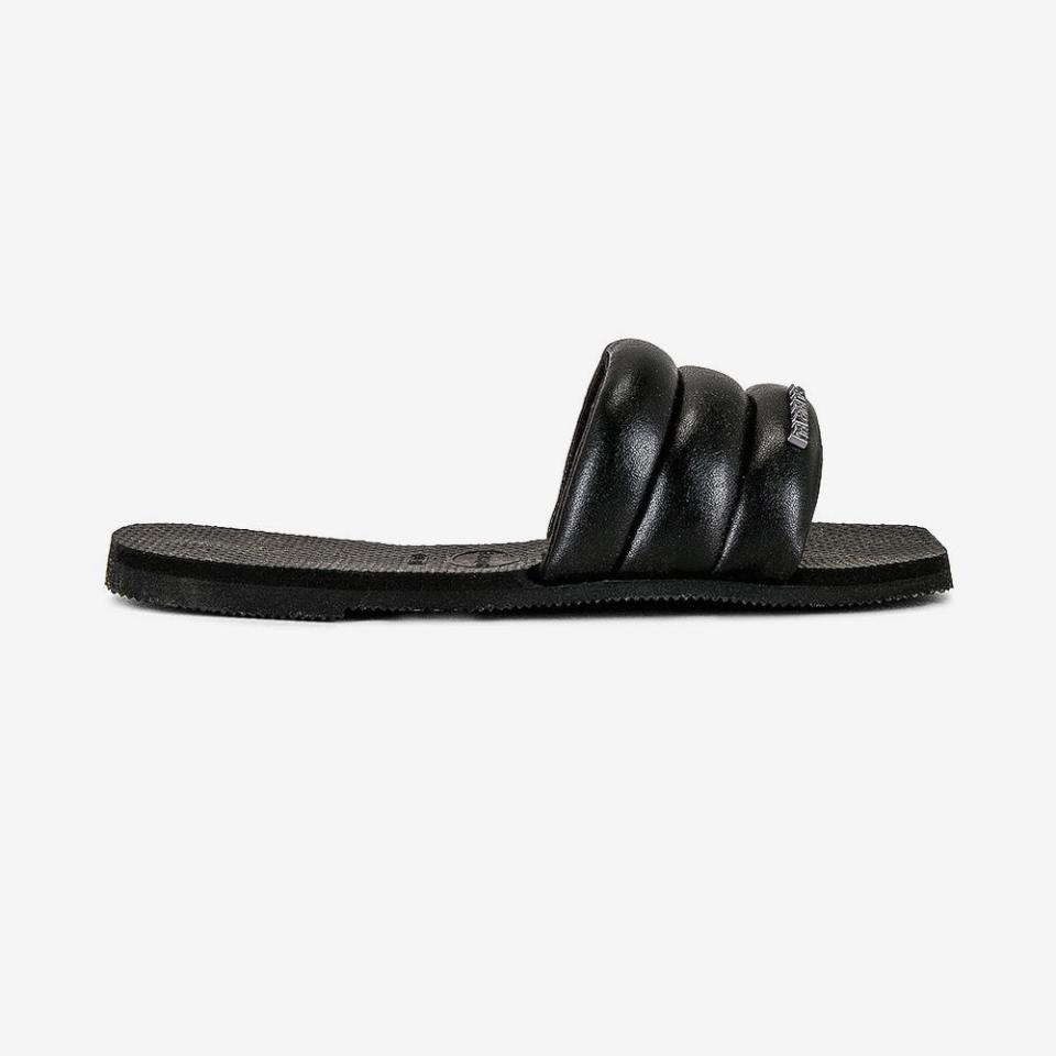 <p><a href="https://go.redirectingat.com?id=74968X1596630&url=https%3A%2F%2Fwww.revolve.com%2Fhavaianas-you-milan-sandal-in-black%2Fdp%2FHAVA-WZ324%2F&sref=https%3A%2F%2Fwww.elle.com%2Ffashion%2Fshopping%2Fg39980374%2Fbest-summer-shoes%2F" rel="nofollow noopener" target="_blank" data-ylk="slk:Shop Now;elm:context_link;itc:0;sec:content-canvas" class="link ">Shop Now</a></p><p>You Milan Sandal</p><p>Revolve </p><p>$62.00</p>