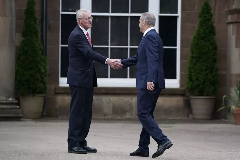 Northern Ireland Secretary Hilary Benn (left) and Tanaiste Micheal Martin ahead of a meeting at Hillsborough Castle in Belfast.