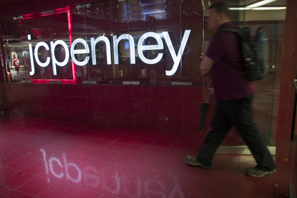 FILE- In this May 16, 2018, file photo, a man enters the JC Penney store at the Manhattan mall in New York. J.C. Penney Co. reports earnings Thursday, Aug. 16. (AP Photo/Mary Altaffer, File)