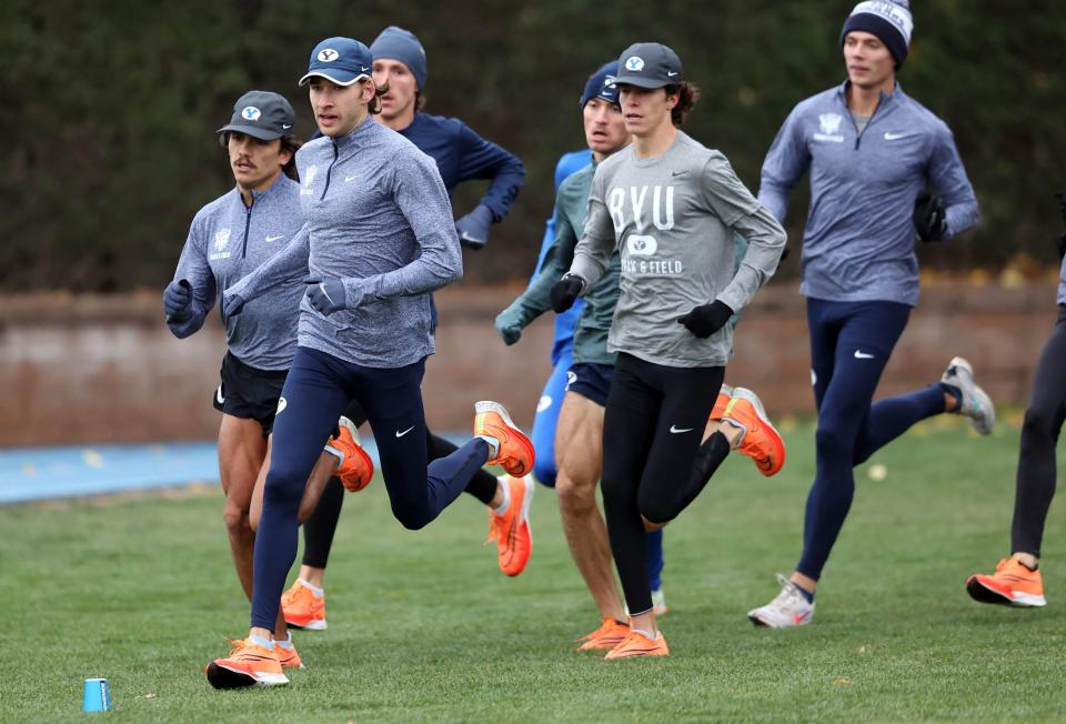 BYU’s Casey Clinger (left front) works out with his cross-country teammates at BYU in Provo on Wednesday, Nov. 9, 2022. | Scott G Winterton, Deseret News