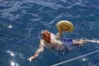 <p>Walter Cronkite swims in the Caribbean Sea in 1971. </p>