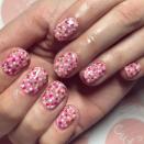 <p>When in doubt, dot it out. Mix pink, peach, white, and gold mini dots for a really fun nail look. </p><p><a href="https://www.instagram.com/p/B_Rh25ujglL/" rel="nofollow noopener" target="_blank" data-ylk="slk:See the original post on Instagram;elm:context_link;itc:0;sec:content-canvas" class="link ">See the original post on Instagram</a></p>