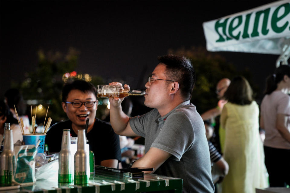 Residents drink during the Wuhan Beer Festival on August 21, 2020 in Wuhan, Hubei, China.<span class="copyright">Getty Images</span>