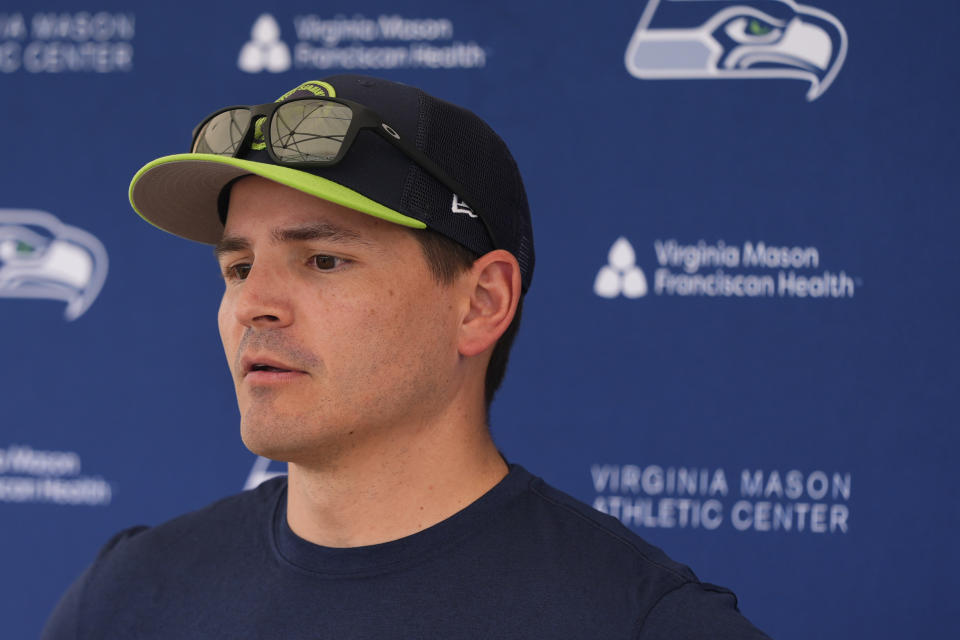 Seattle Seahawks head coach Mike Macdonald answers media questions following the NFL football team's rookie minicamp Friday, May 3, 2024, in Renton, Wash. (AP Photo/Lindsey Wasson)