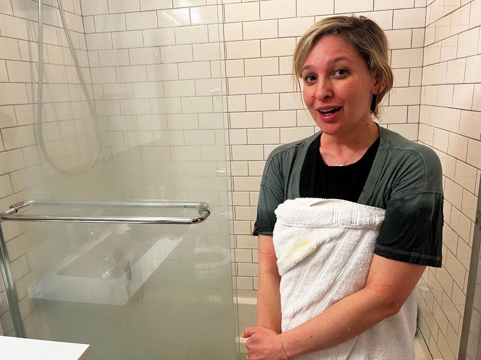 jen standing in front of her shower right out of an ice bath