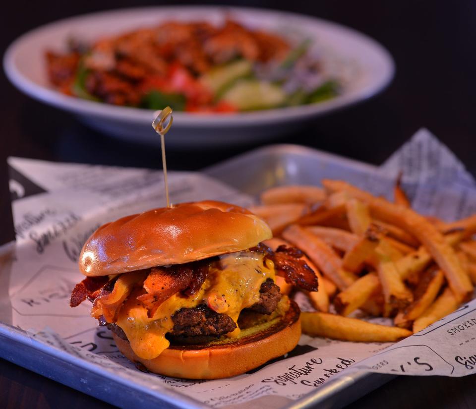 Rigsby's Smoked Burgers Wings & Grill at 176 N. Liberty Street in Spartanburg, Wednesday, December 8, 2021. The new restaurant has opened in the former Hub City Co-op building. The Dirty South Burger with Fries.