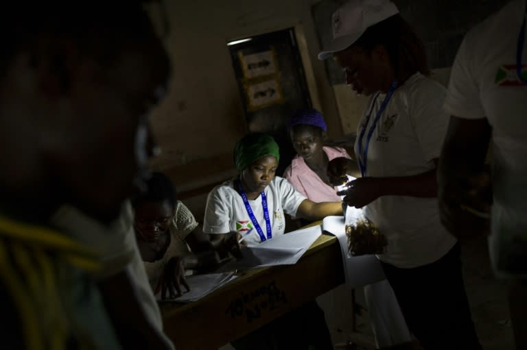 Staff from the independent national electoral commission count ballots in the Kinama neighbourhood in Bujumbura, on June 29, 2015