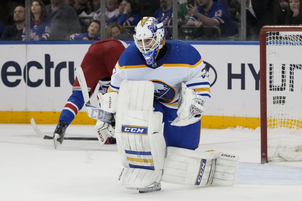 Buffalo Sabres goaltender Devon Levi (27) reacts after making the game-winning save against New York Rangers right wing Kaapo Kakko (24) during the overtime shootout period of an NHL hockey game, Monday, April 10, 2023, in New York. (AP Photo/John Minchillo)