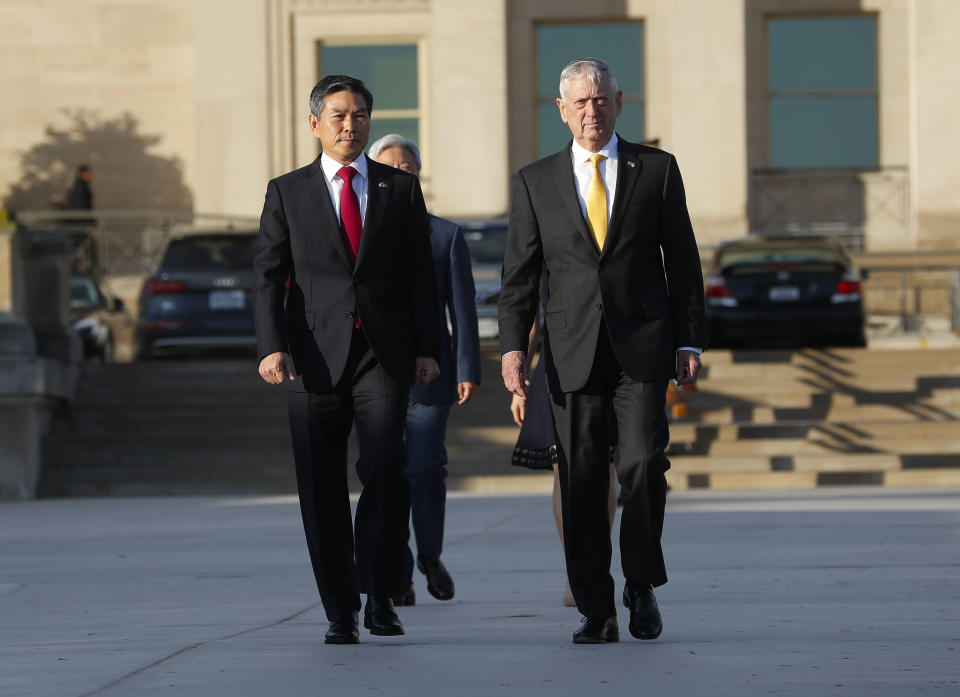 Defense Secretary Jim Mattis, right, and South Korea Minister of Defense Jeong Kyeong-doo, left, arrive to begin reviewing the troops as they co-host the 2018 Security Consultative at the Pentagon, Wednesday, Oct. 31, 2018. (AP Photo/Pablo Martinez Monsivais)