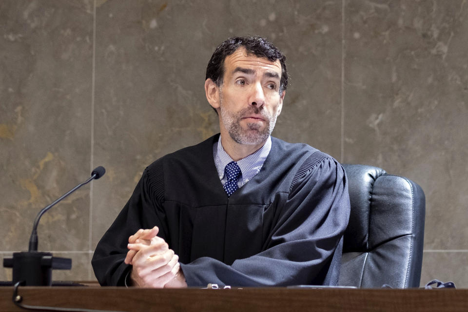 FILE - Fulton County Superior Court Judge Robert McBurney instructs potential jurors during proceedings to seat a special purpose grand jury on, May 2, 2022, in Atlanta. McBurney overturned Georgia’s ban on abortion starting around six weeks into a pregnancy, ruling Tuesday, Nov. 15, 2022, that it violated the U.S. Constitution and U.S. Supreme Court precedent when it was enacted and was therefore void. McBurney's ruling took effect immediately statewide, though the state attorney general's office said it appealed it. The ban had been in effect since July. (AP Photo/Ben Gray, File)