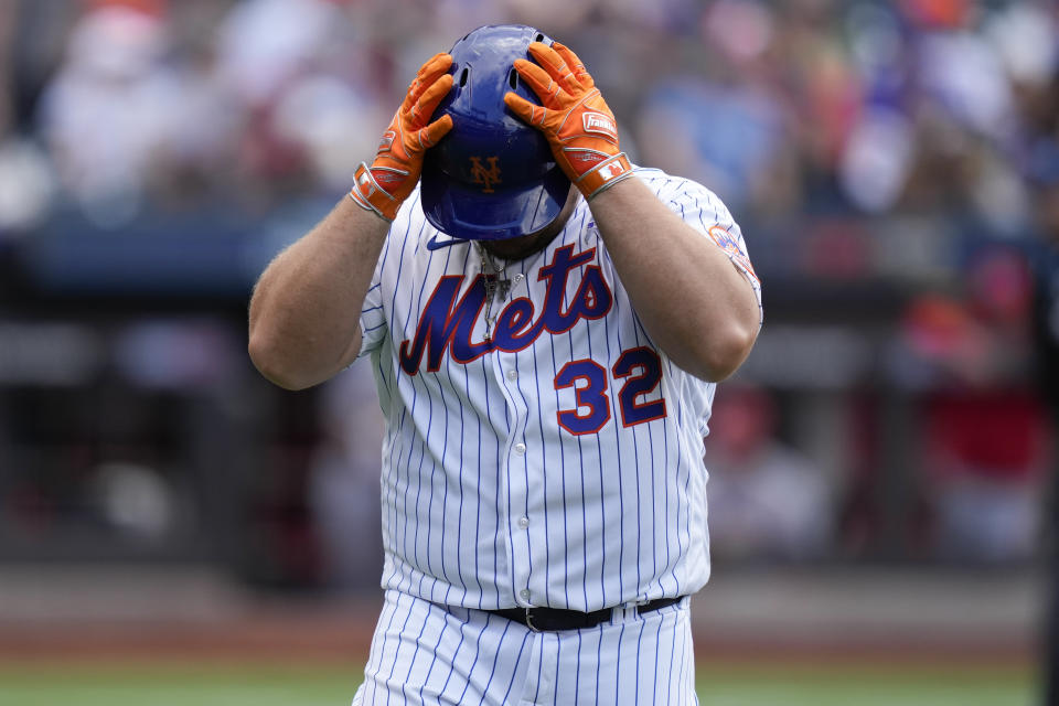 New York Mets' Daniel Vogelbach reacts after striking out during the ninth inning of a baseball game against the St. Louis Cardinals at Citi Field, Sunday, June 18, 2023, in New York. The Cardinals defeated the Mets 8-7. (AP Photo/Seth Wenig)
