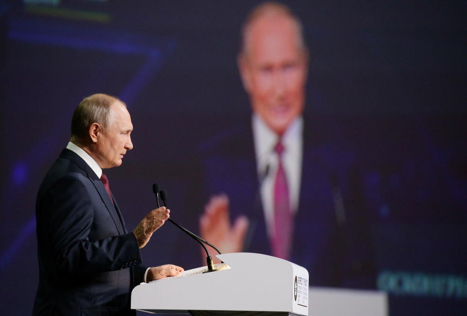 Russian President Vladimir Putin speaks at the St. Petersburg International Economic Forum in St. Petersburg, Russia, Friday, June 4, 2021. Russian President Vladimir Putin on Friday praised his country's response to the COVID-19 pandemic and called for a stronger global response to global warming. (Vladimir Smirnov/TASS News Agency Pool Photo via AP)