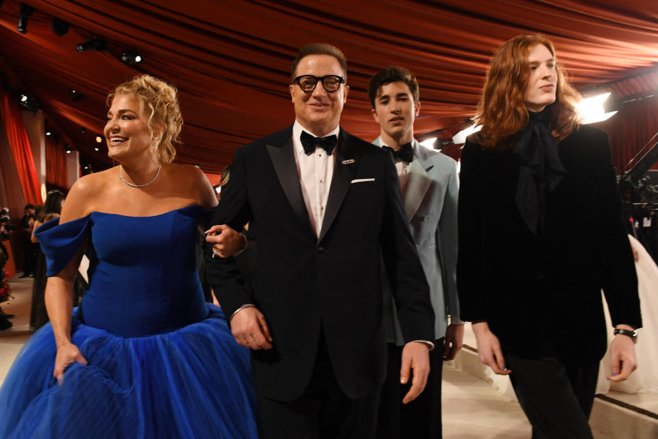 S actor Brendan Fraser (2L) attends the 95th Annual Academy Awards at the Dolby Theatre in Hollywood, California on March 12, 2023.