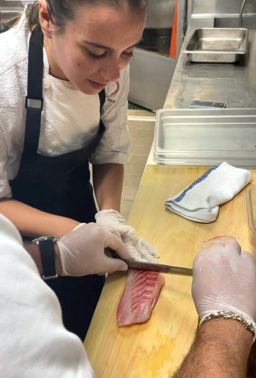 Anneta slicing sashimi at Providence