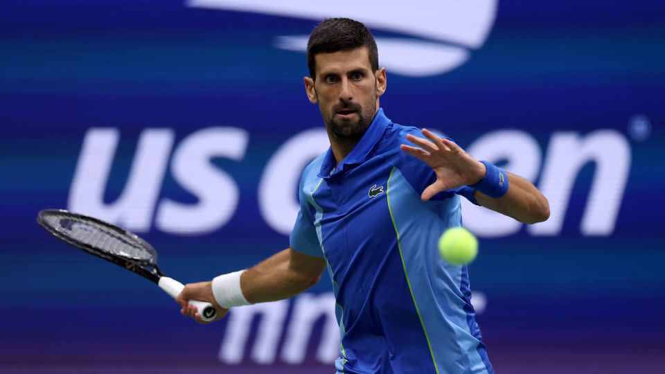 Novak Djokovic returns a shot against Daniil Medvedev at the US Open's men's final in 2023. They both are signed by Lacoste. - Mike Stobe/Getty Images