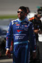 Bubba Wallace watches qualifications for a NASCAR Cup Series auto race at Michigan International Speedway in Brooklyn, Mich., Friday, Aug. 9, 2019. (AP Photo/Paul Sancya)