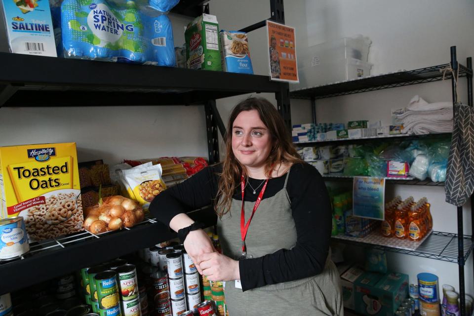 Jenni Palkovic, a transitional living care coordinator for Waypoint, talks about the pantry at the Rochester drop-in center to help homeless youth. The center has seen anywhere from 8-18 youth a day.