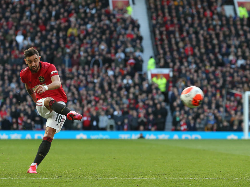 MANCHESTER, ENGLAND - MARCH 08: Bruno Fernandes of Manchester United has a shot on goal during the Premier League match between Manchester United and Manchester City at Old Trafford on March 08, 2020 in Manchester, United Kingdom. (Photo by John Peters/Manchester United via Getty Images)