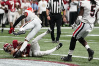 Alabama quarterback Bryce Young (9) scores a touchdown during the first half of the Southeastern Conference championship NCAA college football game against Georgia, Saturday, Dec. 4, 2021, in Atlanta. (AP Photo/John Bazemore)