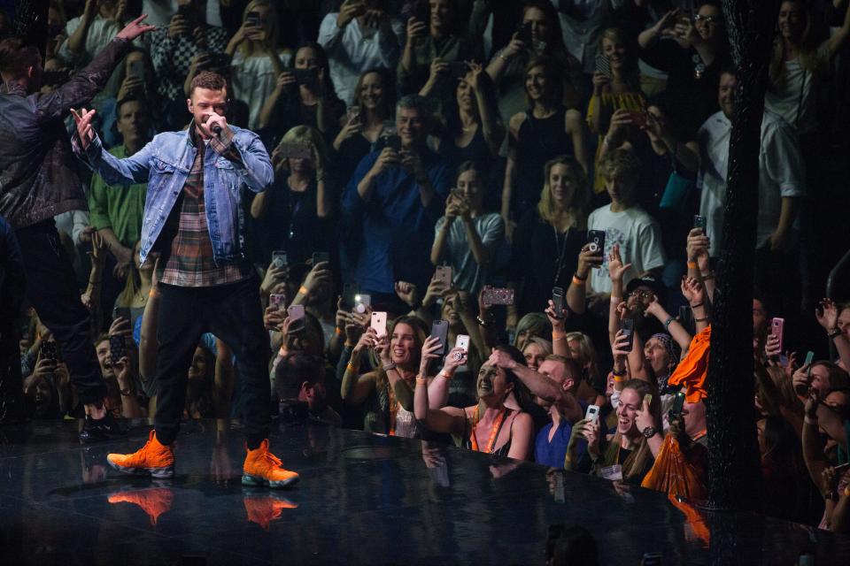 Excited fans watch Justin Timberlake perform at Nationwide Arena in 2018, one of many times the singer has appeared in Columbus. He will return to Nationwide on Oct. 23.