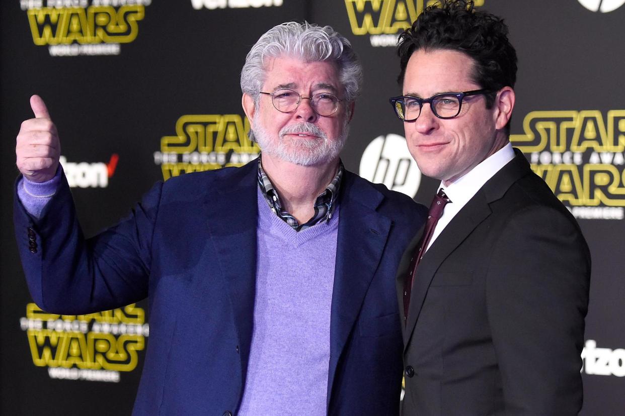 George Lucas and writer-director JJ Abrams attend the premiere of Star Wars: The Force Awakens on 14 December, 2015 in Hollywood, California: Frazer Harrison/Getty Images