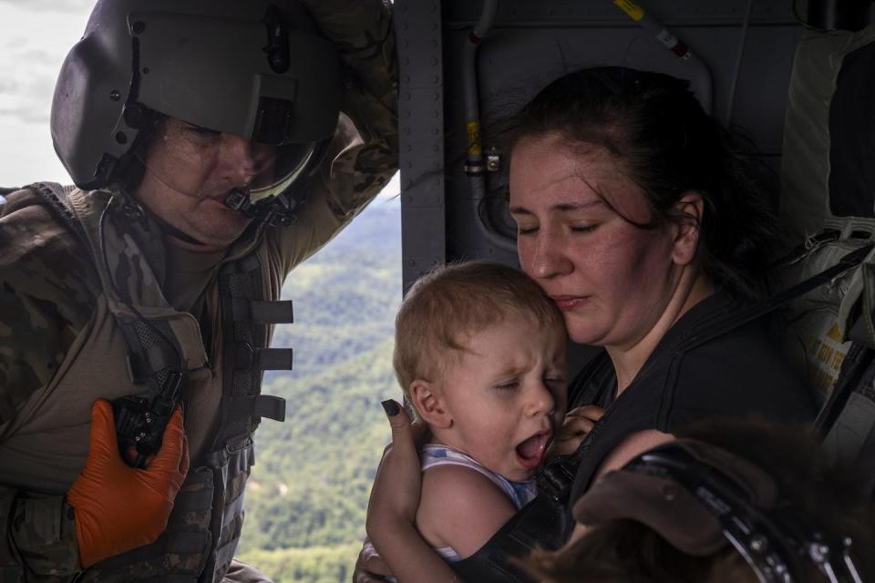 A family had to be airlifted from their home in eastern Kentucky after it was surrounded by floodwater in July 2022. <a href="https://www.gettyimages.com/detail/news-photo/command-sergeant-major-tim-lewis-of-the-kentucky-national-news-photo/1242203173" rel="nofollow noopener" target="_blank" data-ylk="slk:Michael Swensen/Getty Images;elm:context_link;itc:0;sec:content-canvas" class="link ">Michael Swensen/Getty Images</a>