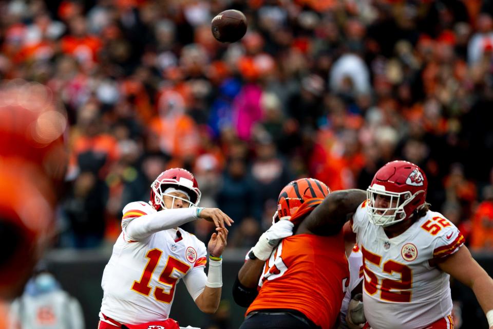 Kansas City Chiefs quarterback Patrick Mahomes (15) throws a touchdown pass in the first half of the NFL game between the Cincinnati Bengals and the Kansas City Chiefs on Sunday, Jan. 2, 2022, at Paul Brown Stadium in Cincinnati. 