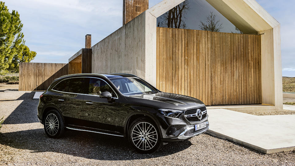 The Inside the 2023 Mercedes-Benz GLC300 parked in front of a house