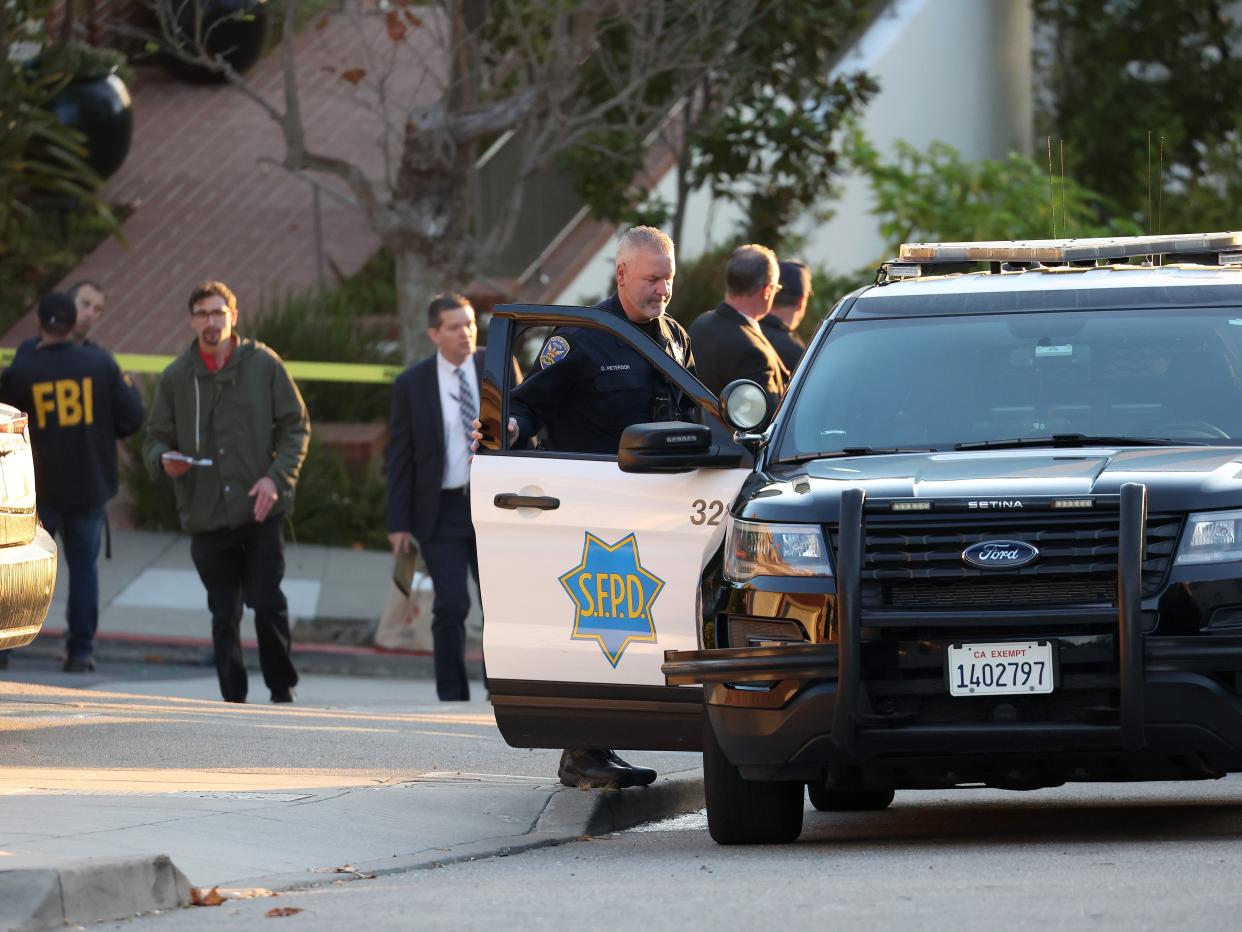 San Francisco police officers and F.B.I. agents gather in front of the home of U.S. Speaker of the House Nancy Pelosi (D-CA) on October 28, 2022 in San Francisco, California.