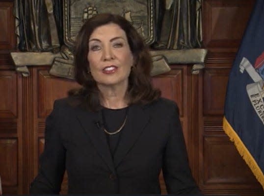 Gov. Kathy Hochul speaks on Thursday, Aug. 23, 2023, about her efforts to get the Biden administration to speed up worth authorization for asylum seekers.