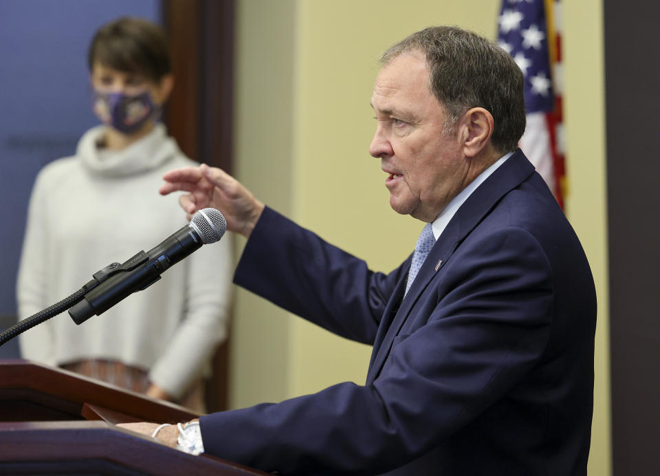 Utah Gov. Gary Herbert speaks as he joins state epidemiologist Dr. Angela Dunn at a press conference at the Capitol in Salt Lake City, clarifying the state's mask mandate on Monday, Nov. 9, 2020. (Scott G Winterton/The Deseret News via AP, Pool)