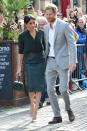 <p>For an official visit to Sussex with Prince Harry on Oct. 3, 2018, in Chichester, U.K., the Duchess of Sussex wore a blouse from & Other Stories and a Hugo Boss skirt, and carried the Gabriela Hearst Demi emerald satin bag. (Photo: Getty images) </p>