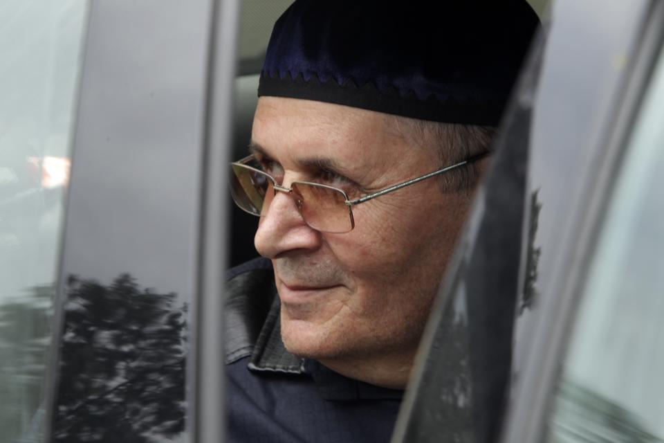 Oyub Titiev, the head of a Chechnya branch of the prominent human rights group Memorial, looks out from a car as he leaves a prison in Argun, Russia, Friday, June 21, 2019. Titiyev was released from a Russian prison on Friday morning, more than 18 months after first being detained on drug charges his supporters say were fabricated. (AP Photo/Musa Sadulayev)