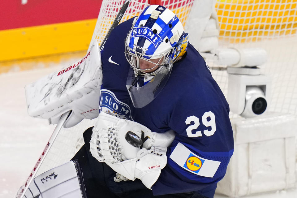 Finland's goalkeeper Harri Sateri makes a save during the preliminary round match between Czech Republic and Finland at the Ice Hockey World Championships in Prague, Czech Republic, Friday, May 10, 2024. (AP Photo/Petr David Josek)